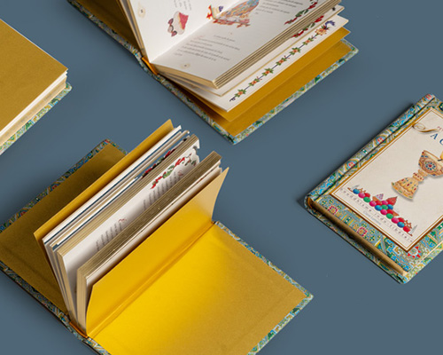 Copertina in cartone imbottito con dorso tondo e labbratura oro